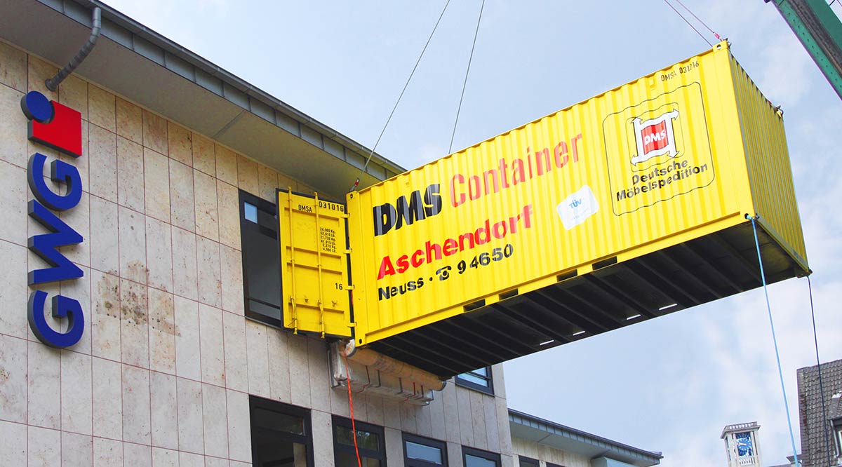 GWG NEUSS. Effizienter Kran-Containerumzug mit DMS Aschendorf